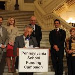 Michael Churchill speaking at a Pennsylvania School Funding Campaign press conference in Harrisburg, PA in 2013.