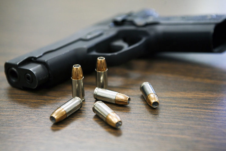 A handgun with bullets